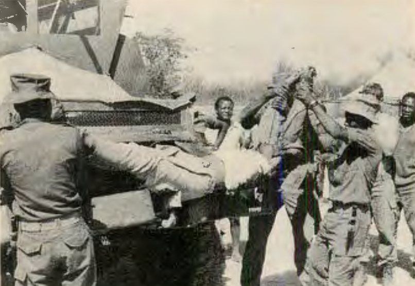 South African Army troops lift body of dead terr off Hippo armored vehicle during operations on Angolan border. Terrs usually concentrate on c1v1hans, try to avoid better trained and disciplined SA army troops.