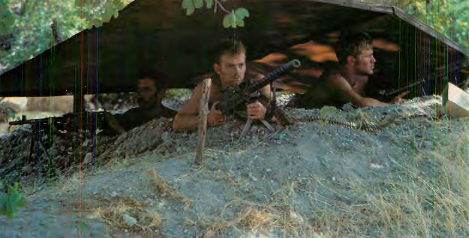 Static position guarding mounted bivouac position near Angola. Weapons are from left: FN rifle, Browning light machine gun, and British designed Bren gun converted to .308.