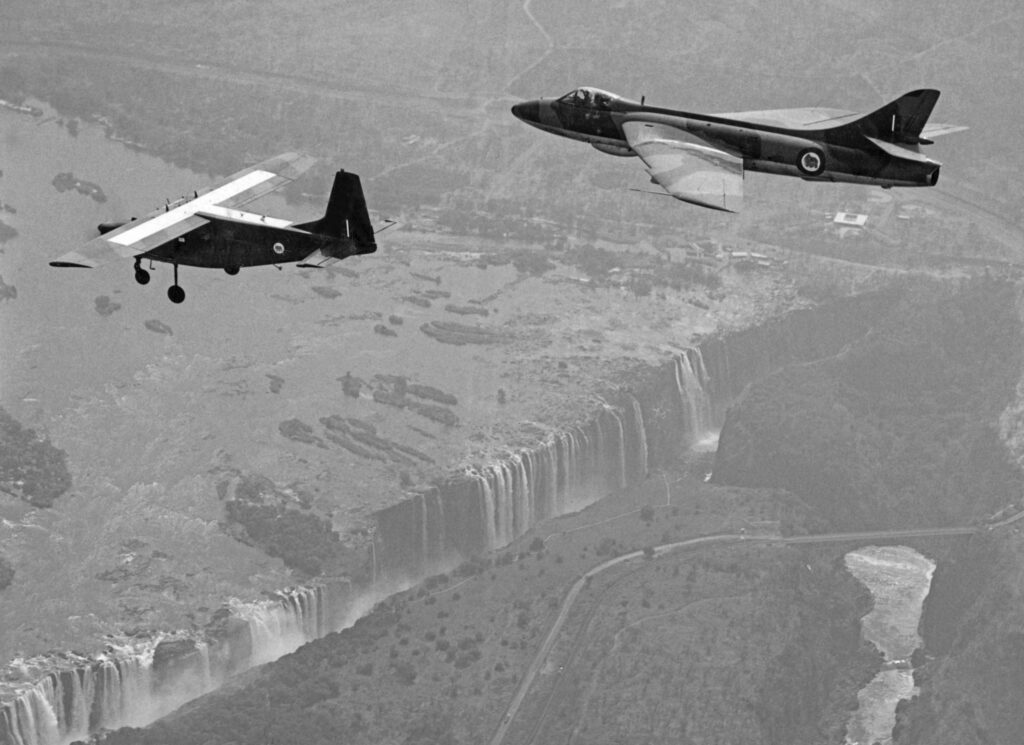 Hunter FGA9 R1198 with an Aermacchi AL-60 over the Victoria Falls in 1970. The latter type often carried a forward air controller