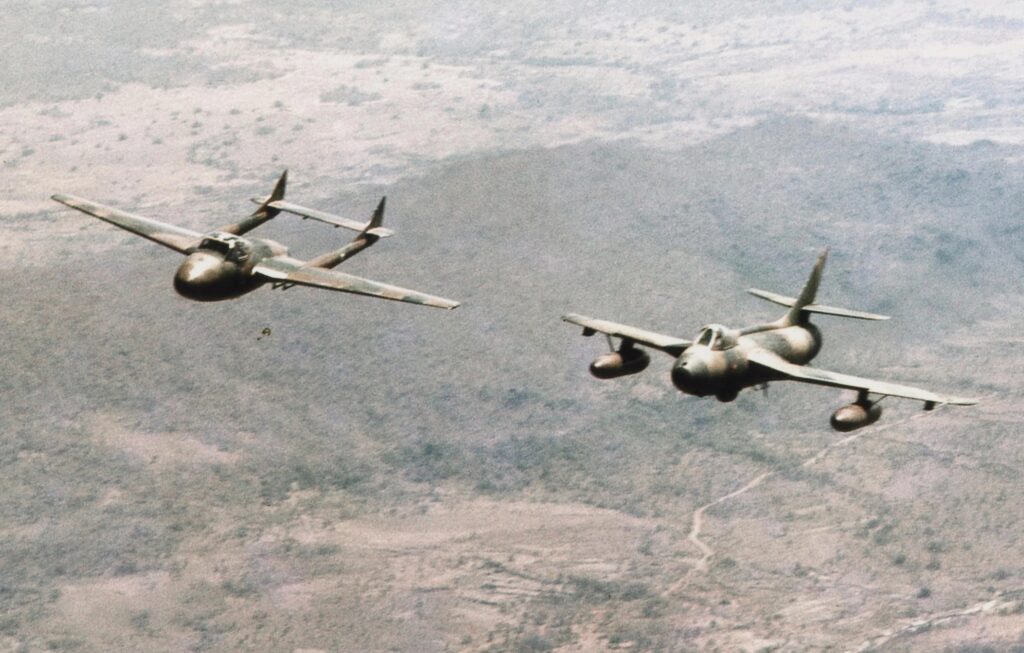 A Hunter with a two-seat Vampire over the pestilential Zambezi Valley in about 1972 as nationalist incursions increased