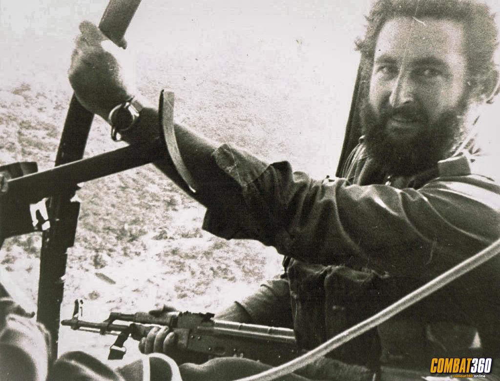 Derek Andrews whilst serving with the Selous Scouts, aboard a French manufactured Aérospatiale Alouette helicopter returning from a successful operation in the Hot Springs region of south-east Rhodesia. Photo: Derek Andrews / Victor Harbor RSL