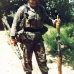 American Volunteer in the Rhodesian Army, Lieutenant Willard "Chomps" Fleetwood poses with a captured terrorist rocket launcher. He is pictured as a junior officer in "A" Coy, 1st Battalion, Rhodesian African Rifles, 1980